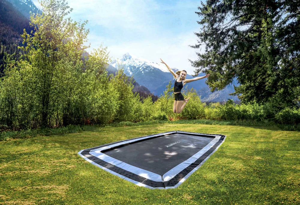 Hvordan installere en nedgravd trampoline