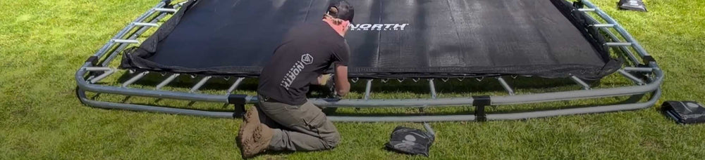 Hvordan monterer jeg en nedgravd trampoline?